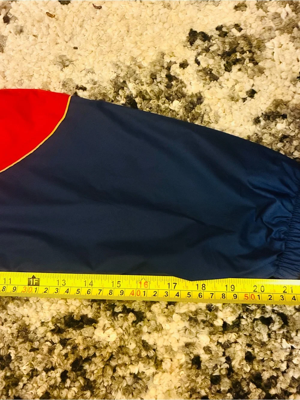Nike windbreaker off hem
